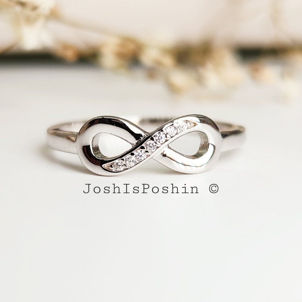 Infinite symbol diamond simulant ring in sterling silver